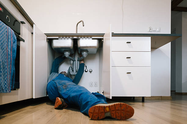Professional Emergency Plumber technician working in Conley, GA
